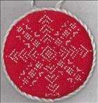 Stitched on red fabric.