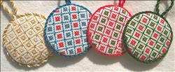 Stitched ornament in a variety of colors.