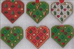 Stitched ornaments in different colors and fabrics.